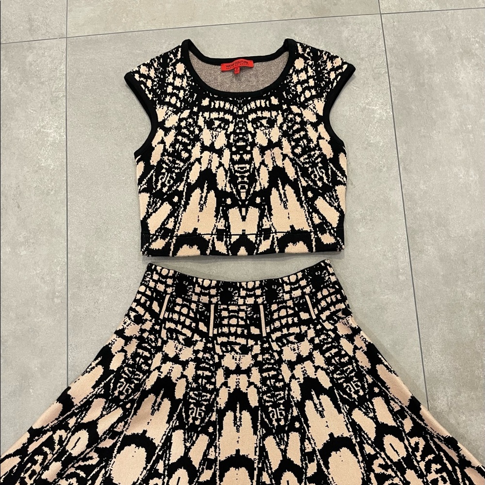 Two piece set. Cropped top where the Skirt